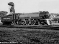 One of Canadian Pacific's five semi-streamlined 4-4-4 Jubilee types rests at Chatham Street roundhouse in Hamilton waiting to return to Toronto.