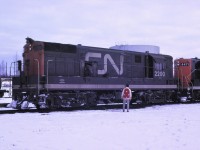 CN's first H-16-44, 2200, was having a temper tantrum on a cold December 1966 morning and did not want to start. The mechanic was making adjustments as the Road Foreman provided encouragement.  CN had a total of 18 of these FM designed units which were built by Canadian Locomotive Company in Kingston, Ontario in 1955.