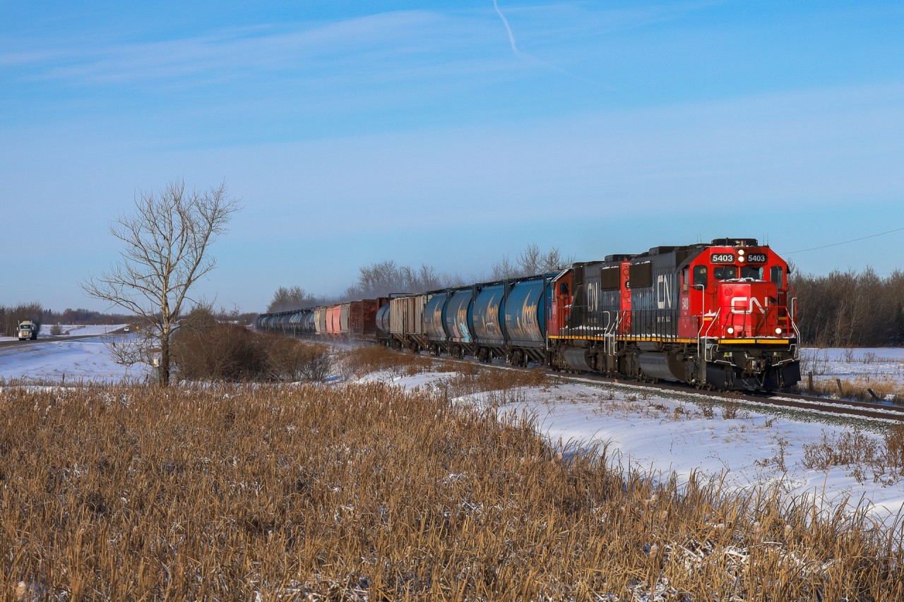 Typically relegated to yard service in Edmonton, CN 5403 and CN 5406 hit the open rails on a frigid December morning with L 51851 02 bound for Camrose, Alberta.