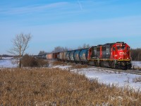 Typically relegated to yard service in Edmonton, CN 5403 and CN 5406 hit the open rails on a frigid December morning with L 51851 02 bound for Camrose, Alberta.  