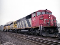 One number older on the roster than the Mile 30 image Mr. Host just posted, CN 5550 waits down by the junction with CN Oakville followed by Sante Fe (BNSF) 6945 and UP 3586.  I had shot this train further up the line and was appreciative of it being held up so I could get another image.  Not often did I see Santa Fe paint on the CN.