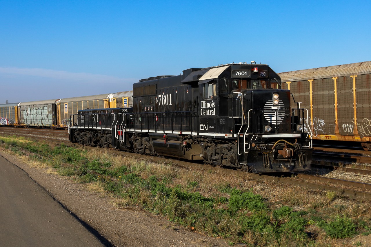 CN 7601 and 601 roll back into Clover Bar, after servicing some customers on the Camrose Sub.