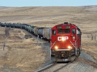 Seeing Bill Hooper's recent post of a train on CP's Expanse Sub reminded my of this spring time chase I made down the line.  This line has no shortage of scenery and is very remote. In this scene CP 2308 and a hidden 3071 lead a good sized train of interchange cars for GWRS in Assiniboia. 