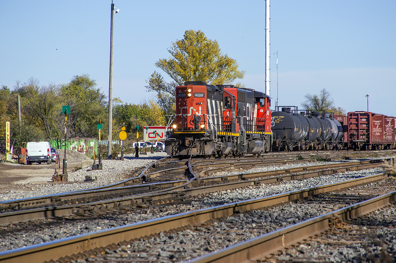 Their work completed in Guelph, 540 has put its train away and begins to move the power to the back track near the office.