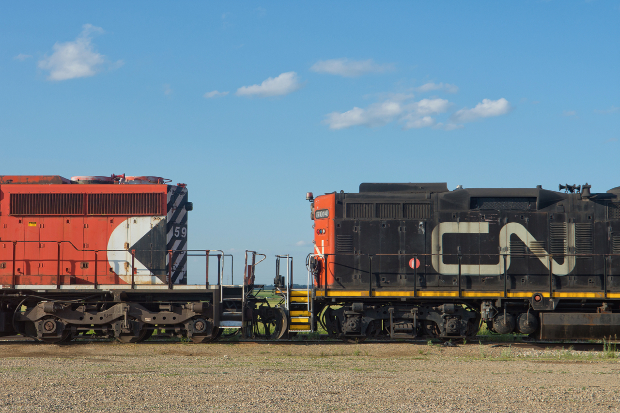 The Multimark and the Noodle. Two units from adversary lineages sit coupled together as they await the scrappers torch.