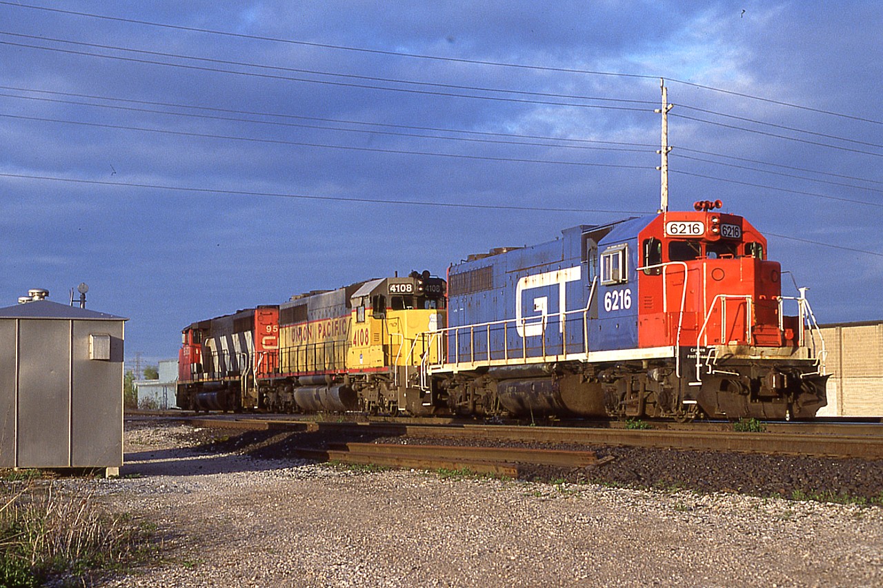 Beautiful late day lighting. CN's #392 is doing some work at the east end of Aldershot yard. Shown is the head end power, CN 9503, UP 4108 and GT 6216.  The UP has just been acquired by CN, and has yet to be temporarily renumbered to 6108 (as to not conflict with the GP9s) and so makes for an interesting catch. The unit would later be upgraded to become CN 5367.