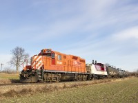 Departing Ingersoll after picking up some propane tank cars out of the siding. Consist includes newly painted 1249. Will be off to work Putnam and St.Thomas. I was only home for a couple of days and only had one shot to catch a passing OSR train before heading off to the airport back to Calgary later that afternoon.