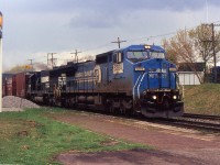 NS 327 with NS C40-8W 8384 and NS SD60 6660 through St. Catharines on the CN Grimsby Sub on May 1, 2005.