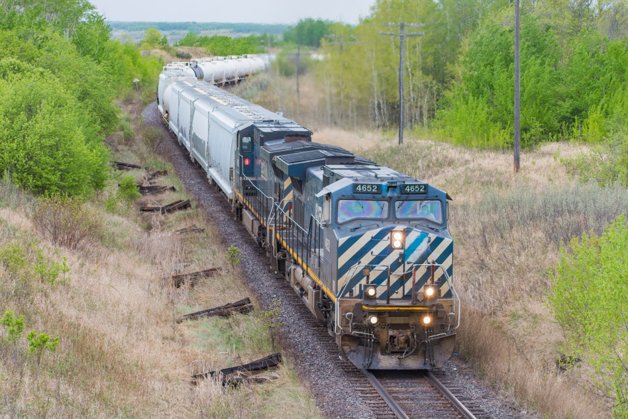 BCOL 4652 and BCOL 4650 lead Z114 approaching Miniota on the Rivers Subdivision after climbing out of the Qu'Appelle Valley.