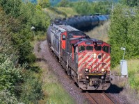 BCOL 4642 leads A404 through  Miniota MB on a September morning. Taken from an overpass that leads to a lookout of the Qu'Appelle Valley