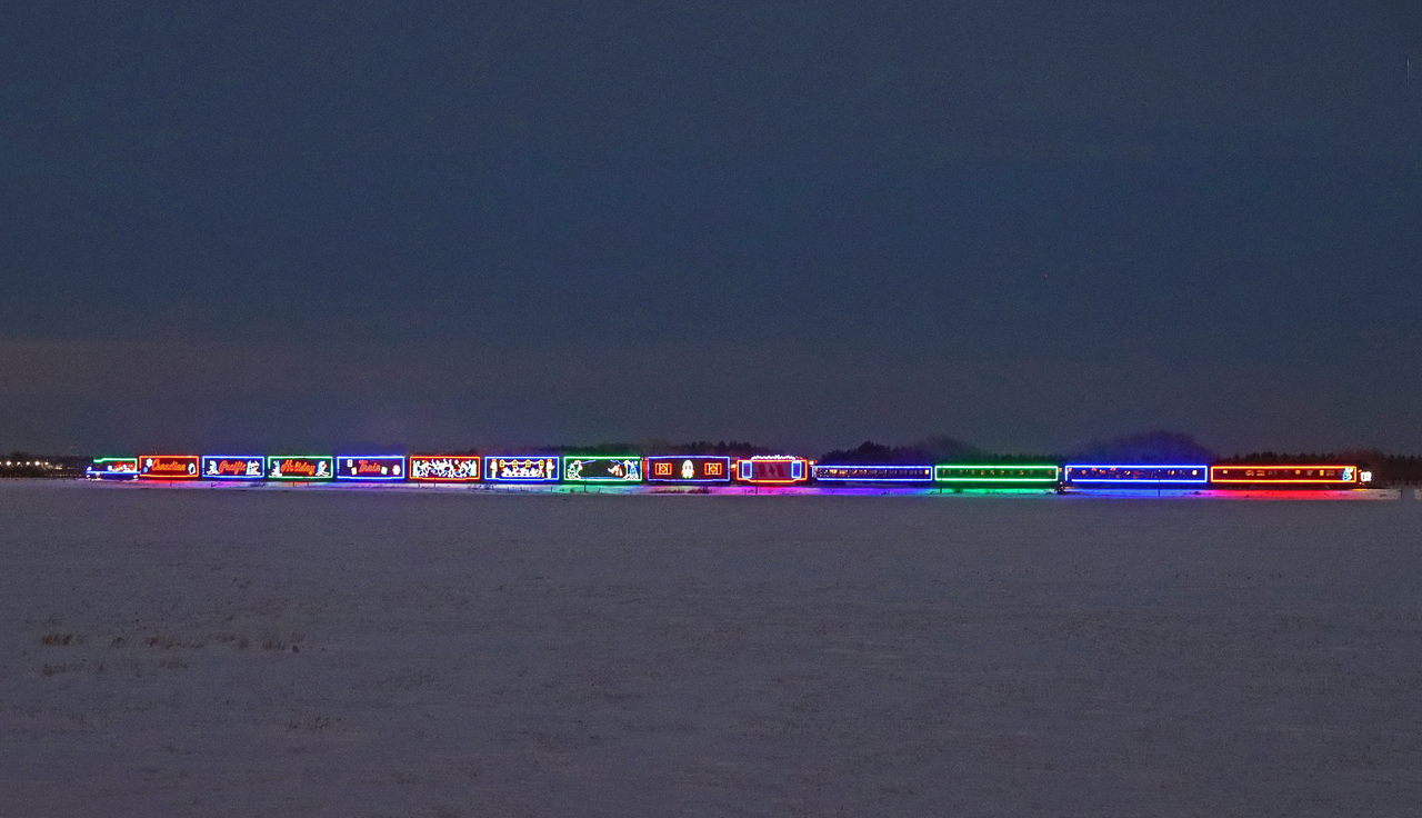 The CP Holiday Train spent December 8th afternoon travelling north on the Leduc Sub, making stops at Blackfalds, Lacombe, Ponoka, Wetaskiwin , Millet and Leduc.  Here it is seen stopped about 3/4 mile south of Wetaskiwin waiting so that it can make an on time arrival at the show site for the enjoyment of the waiting crowds.