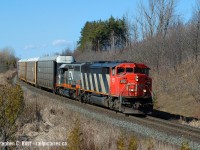 It's been slow on here - so here's an oldie. 2004, Mile 30, an every day train passes an every day location... this is probably CN 275 or 271 which were the automotive trains of the day, I recall 271 had a cut of parts on the head end usually though, possibly from Oakville. If you're looking at this and you're a photographer - submit a photo, it's been nearly 24 hours and I was the only poster safe for a couple photos that need a bit more work to get up here.. :) Post something folks! Now's the time.
