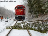 Oops.... a tree is in the way of T72 after an ice storm. What came next? After this my next photo was <a href=http://www.railpictures.ca/?attachment_id=23945 target=_blank>this one</a> but you can guess below what had to be done.