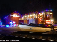 Santa is seen riding his 1923 sleigh at the Halton County Radial Railway. Invited to the <a href=https://hcry.org/ target=_blank>Halton County Radial Railway</a> Museum near Rockwood by <a href=http://www.railpictures.ca/?attachment_id=50370 target=_blank>John Freyseng</a> who has been a member since 1954, Jacob Patterson and I spent the afternoon with the fine volunteers of the HCRR with John as our amazing guide before breaking for supper. After supper Jacob and I went back with our tickets in hand to try some night photography as the volunteers told us they're running until 8 PM, and why the heck not as we had a ticket still in hand. Car 2984 built in 1923 ran it's last mile for a while today as it is now parked for a refurbishment project to repair it and will be out of service for a few years. Chuck Lawrence who was volunteering all day for the hundreds of passengers who rode helped three of us photographers get this shot as they normally don't let anyone out at the "north pole". <br><br>The museum is open tomorrow (Sunday December 11) for the final day of trains until next Spring - if you're around give 'em a visit as they love to have people ride. A few trains per hour depart for round trips and you get to ride a crud ton of variety of cars including their TTC Snowplow which is out right now only during Christmas. Truly a time warp and worth visiting - the last time I was riding here was in the 80's with my Grandfather!<br><br>BTW We have very very very few photos of the old "Toronto Transportation Commission" on the site, but we do, by the late <a href=http://www.railpictures.ca/?attachment_id=9414 target=_blank>Julian Bernard</a> who posted a few. Check out his profile for his stuff actually in revenue service in the 40's and 50's, although none of his pictures seem to be a Peter Witt or this type of car. 