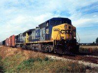 NS 328 with CSX 208 and CSX 8758 approaching St. Catharines on the CN Grimsby Sub during Oct 13/2004.