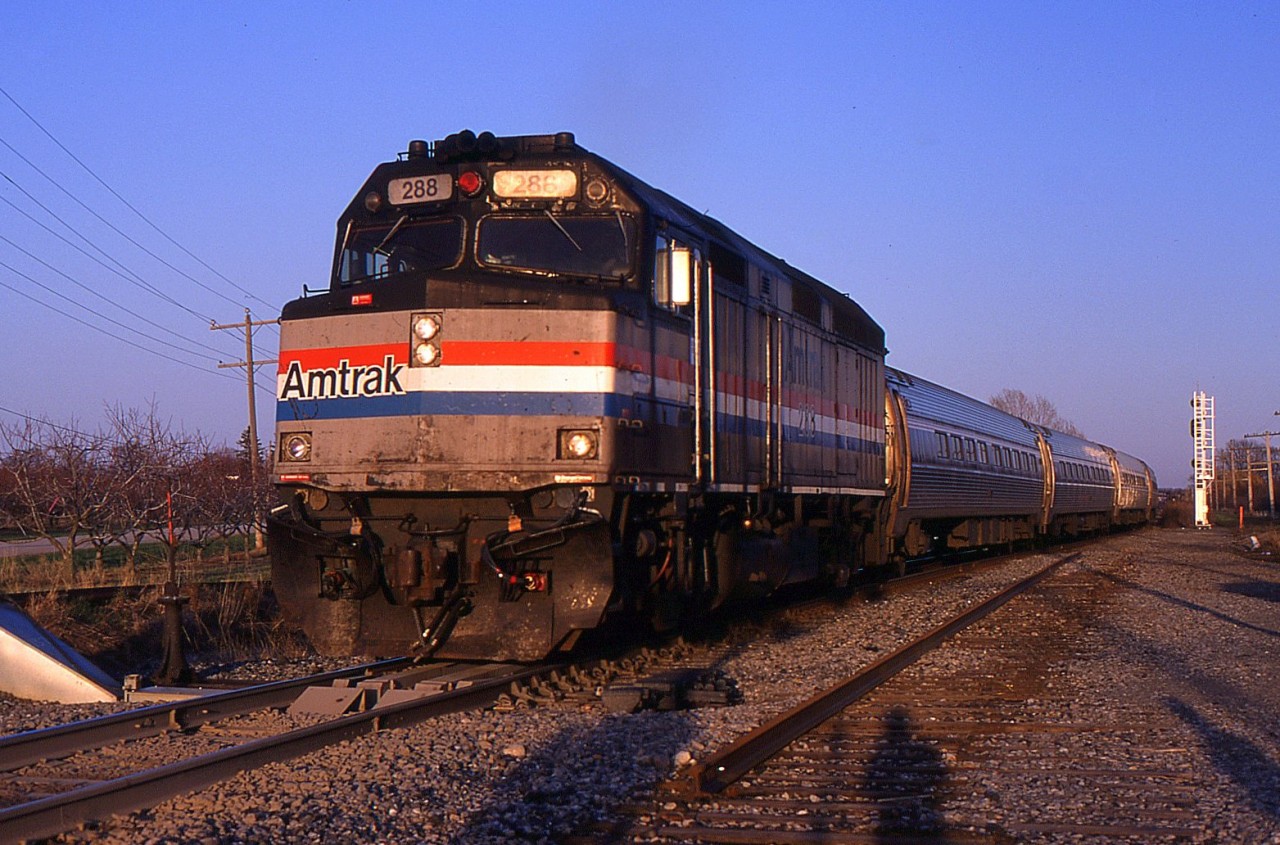 VIA 98 with AMTK F40PH-2 288 crosses over from the south track to the former north track is now the main track at Jordan. This is just after a few months after the CTC Installation was complete for single-track operation between Jordan and Nelles Rd.