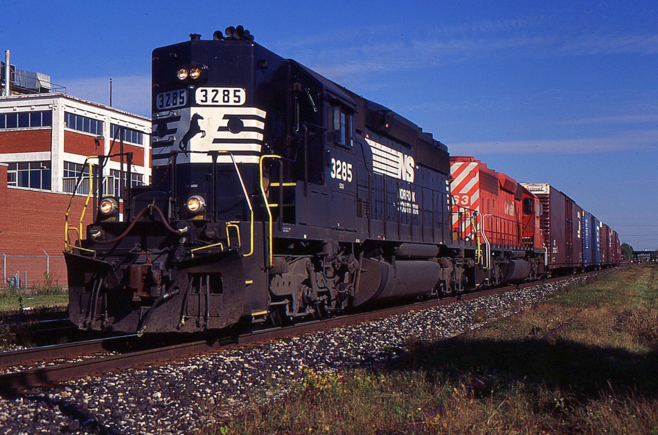 NS SD40-2 3285 high nose unit leads NS 327 through St. Catharines on the CN Grimsby Sub.