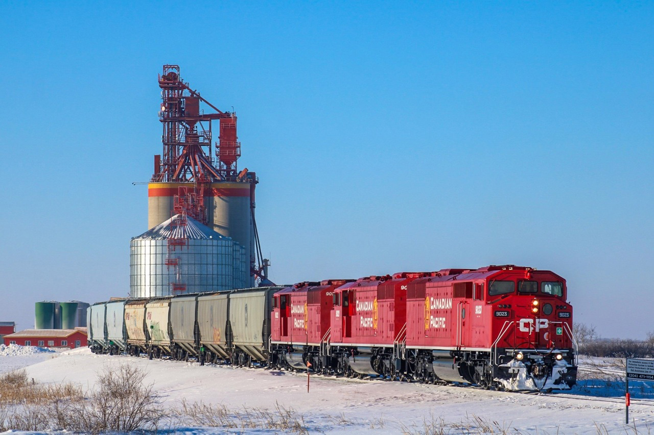 Only 2 days in and I have a backlog of barns... E07-31 spots grain cars for the Richardson Last Mountain Grain Terminal west of Southey at Mile 72 Bulyea Sub. 9023 with class lights still holds onto the leading position before 9022 (no class lights) takes over for their southbound journey towards Moose Jaw.