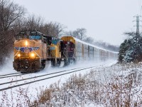A foreign power duo third wheeled by a CP AC44 leads CP 234-12 during an early January snow squall. Having a short train made it easy for the train to pick up speed and kick some snow after holding at Davenport for a Newmarket GO Train.