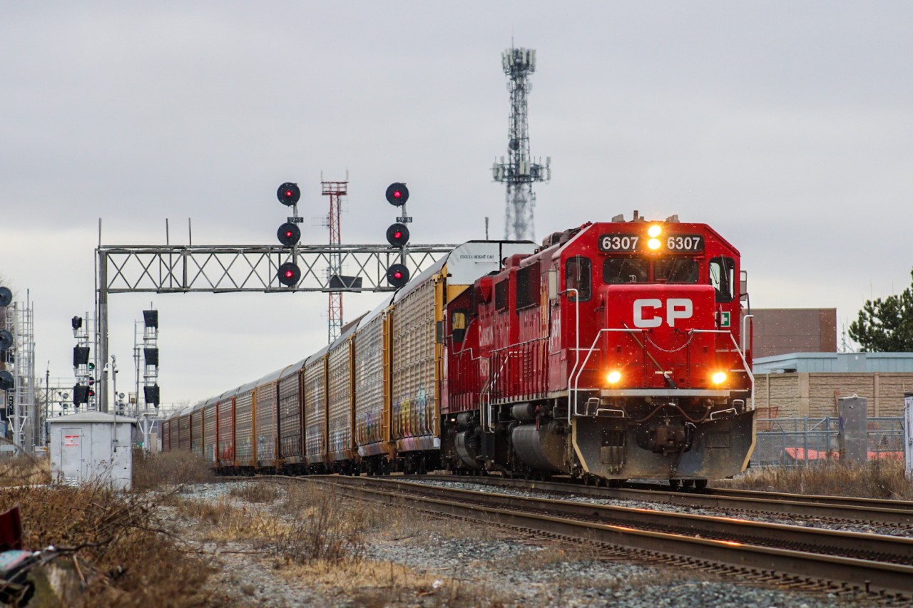 I'm beginning to realize how much I've neglected SD60s as I post this since this is the first one I've actually photographed in the year or two I have been using my camera. In past opportunities, my attention was often distracted by something more valuable, but today the other thing on my radar was an ACU. I was lucky to have picked Osler as my spot for that, otherwise, I would have prematurely headed home without knowing what was coming.