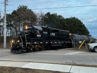 LTEX 3828 is seen taking two tank cars north to the CN interchange from Petro Canada's Mississauga Lubricants Centre. This small industrial operation is operated by Railserve, and presently uses fleet of leased LTEX locomotives to switch cars within the refinery, as well as transport cars to and from their interchange with CN at the Clarkson GO station via the plant's approximately one mile long connecting spur. GP38-3 3828 is the newest addition to the fleet in Clarkson, having arrived on the property in early December 2022. It is the sixth unit to be assigned to the plant since Railserve took over operations from Ontario Southland in 2007.
<br>
<br>
The operation currently has a total of four locomotives (all GP38s) on site. LTEX 3828 and 3829 (GP38-3s, rebuilt in 2022 and 2021 respectively) are presently the regular units used for the operation and were leased as the company looked to newer locomotives to have alongside their two "older" units - LTEX 2077 and 3803 (unrebuilt GP38s, both of Aberdeen, Carolina & Western heritage), which are now only used as backup locomotives if needed. The company has also used a red and grey GP38-3, LTEX 3830, on the operation from October 2020 to November 2022, as well as a Railserve-lettered GP10, numbered RSSX 1078, for a short time around 2013.