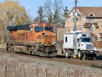 Yes the Galt subdivision almost seems dead enough somedays you probably could drag race on it, LOL, but this was not the case. Light power CP train 234 has BNSF 8375 fir power as it rolls past a track inspection vehicle in Streetsville on a sun but cold winters day.