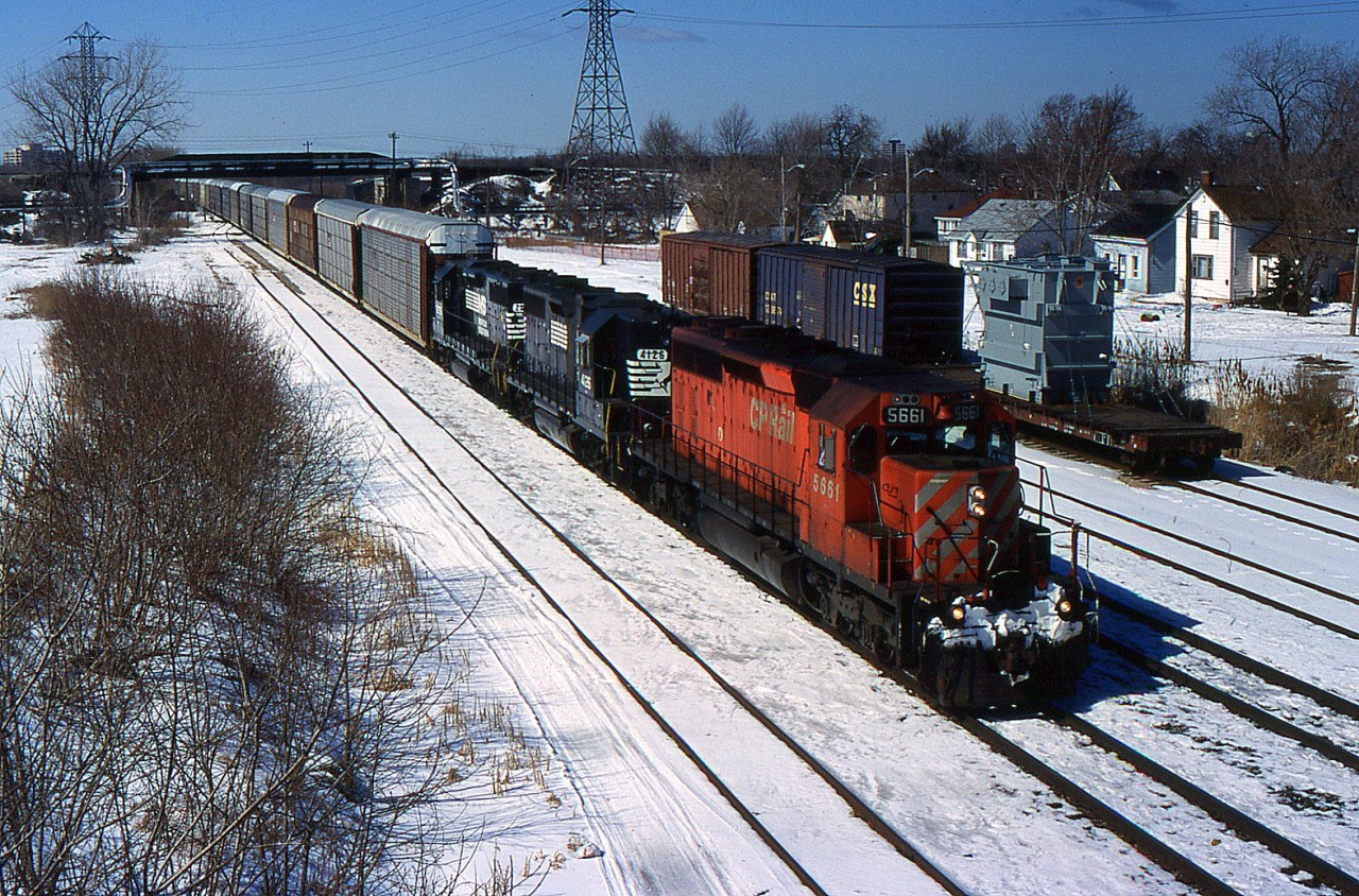 CP SD40-2 5651 leads NS 328 through Merritton on the CN Grimsby Sub during 1999.
