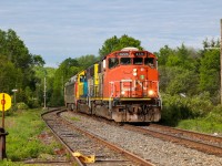 CN 4771 leading northbound ONR 901 track geometry train, ONT 2200 and CN 1501 trailing, at Feronia