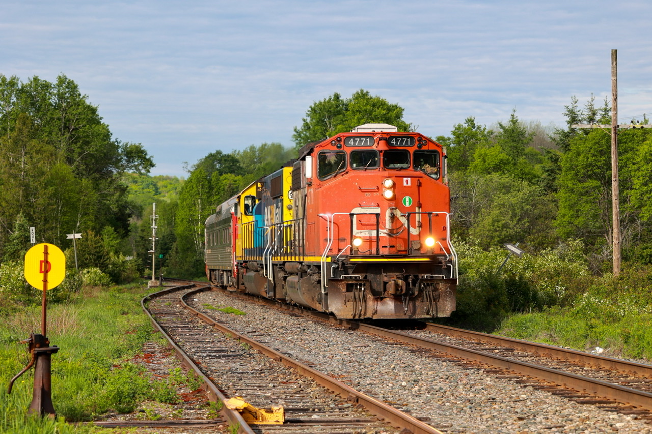 CN 4771 leading northbound ONR 901 track geometry train, ONT 2200 and CN 1501 trailing, at Feronia