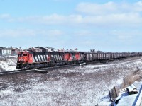 CN C630 number 2023 leads an extra along the York Sub toward Toronto Yard.  Power for the train is 2023 2016 3836 and 9510.  Those were the days with no graffiti.