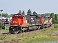 A pair of oldies lead a CN freight south out of Capreol, Ontario on July 13th, 2015.  2028 was built for the C&NW in March 1989 as their 8529.  It later became UP 9051.  The trailing unit is 2423 which was built for CN in March 1990.
It is interesting to note the train order board located within the museum's grounds.  CN made the museum remove the blades as it might confuse train crews. 
Train number 314 is a guess.