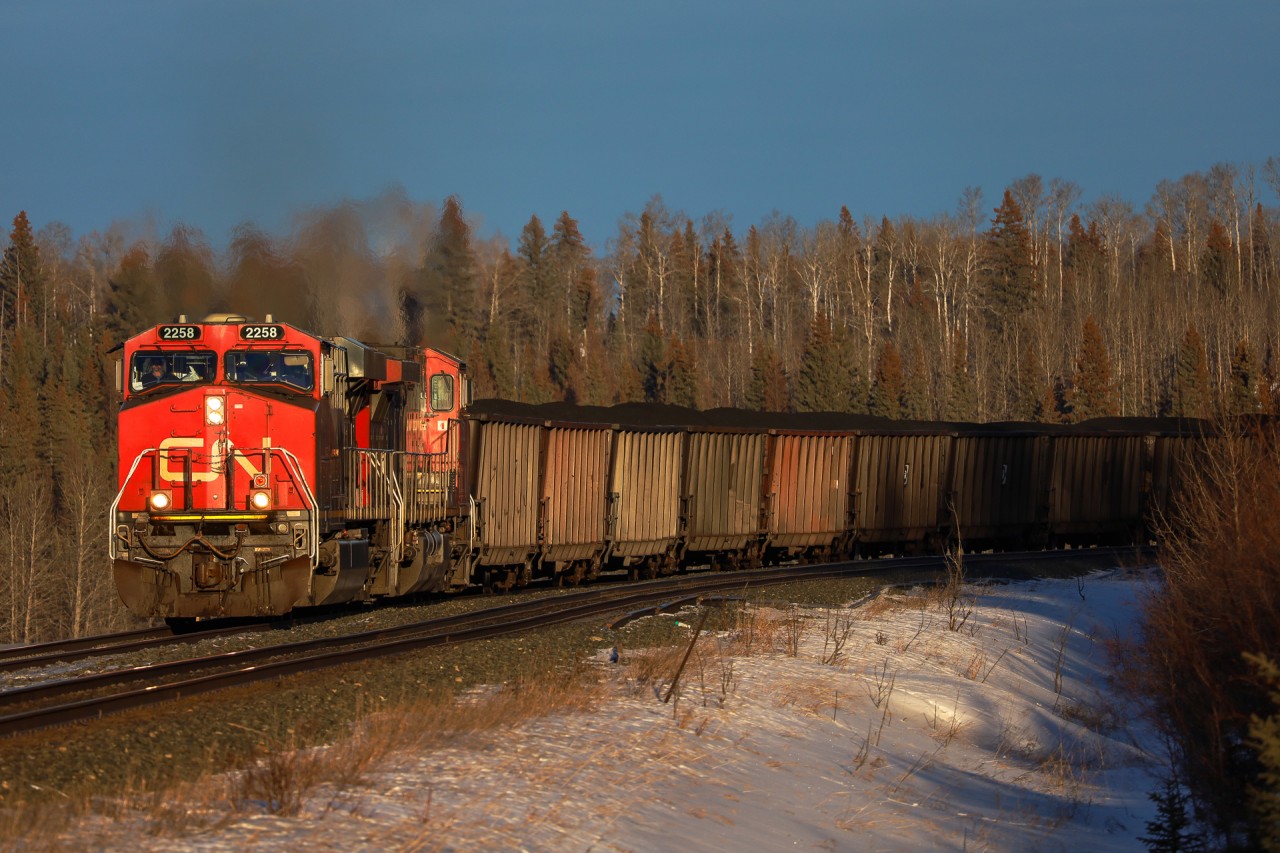 Chicago to Prince George M 34791 05 grinds upgrade through Marlboro, as the sun sets on a beautiful day in the foothills.