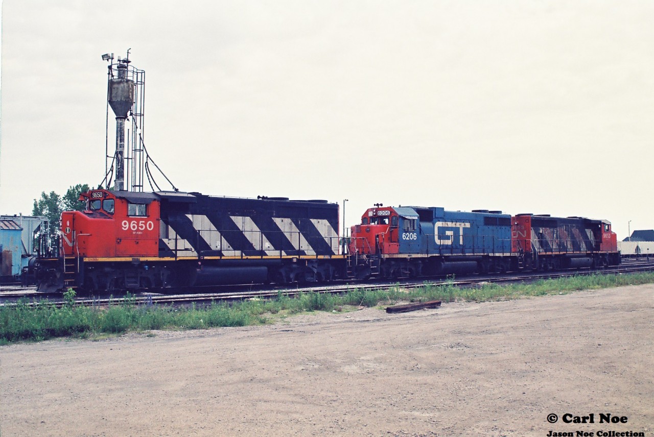 CN 9650, GTW 6206 and CN 9653 are viewed outside the CN Sarnia, Ontario diesel facility during a hot and hazy summer day.