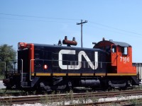 SW 7166 sits in the Dain City CN/Norfolk Western (Southern) Intermodal Yard.  In later years the operation was one of the very few container operations in Ontario.  If you needed a train fix on the drive from Welland to Port Colborne, Dain City was guaranteed to please with what seemed like endless shunting of Intermodal cars that blocked Canal Bank St./Kingsway just south of the John Deere Plant (originally called DAIN MFG. - hence the town name Dain City).  Intermodal / Container operations ended here in 1998.  Dain City was also referred to as Welland Junction, as the CNR Cayuga Sub (Canada Air Line), and CNR Humberstone Sub (Welland Railway) intersected on diamond. You can still see remnants of the original Humberstone Sub that dead ends on the north side of Forks Road E.  VERBIO Bio-Diesel stores tank cars on that section. The Dain City area is set to undergo an incredible transformation as a housing redevelopment on the former John Deere site. The community has been disconnected from Port Colborne since the Forks Road Bridge was removed in 2019 for safety concerns, but a new bridge should be up by 2024.  