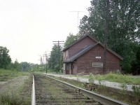 A view looking west along the CP Havelock sub featuring the old Cavan station. This community was located about 10 miles west of Peterborough.  The station is in rough shape, and not long after this photo was taken it was torn down.  I do not have the exact date but no doubt it met its demise when CP did some "housekeeping" along the line in the latter half of the 1970s.
Today this track is part of a CP "Internal Short line", the Kawartha Lakes Railway.
