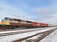  A rare sunny morning for this time of year, and a drive by the CP Welland Yard resulting in this nicely lit consist. CP7011-7033-7040. The two lead units are shut down with just 7040 idling.