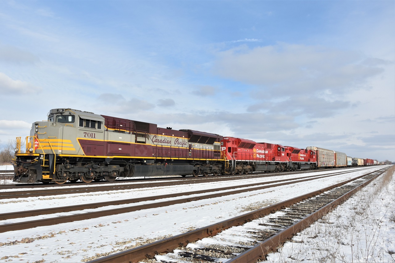 A rare sunny morning for this time of year, and a drive by the CP Welland Yard resulting in this nicely lit consist. CP7011-7033-7040. The two lead units are shut down with just 7040 idling.