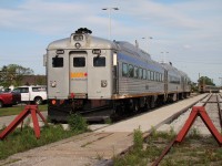 Three VIA Rail RDC's are seen here at Walkerville (Windsor) waiting to take on passengers for the Memorial Cup, which was being held 4 miles down the tracks at the WFCU Centre. VIA shuttled passengers between here and the arena during the event using these RDC's. In the background VIA #76 can be seen reversing into the station after wyeing at Jefferson, a practice which will fade when VIA's new trainsets are in service.