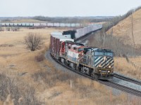 BCOL 4646, BCOL 4609 and CN 2020 take X304 out of the Quappelle Valley towards approaching Stenberg on the Rivers Subdivision.