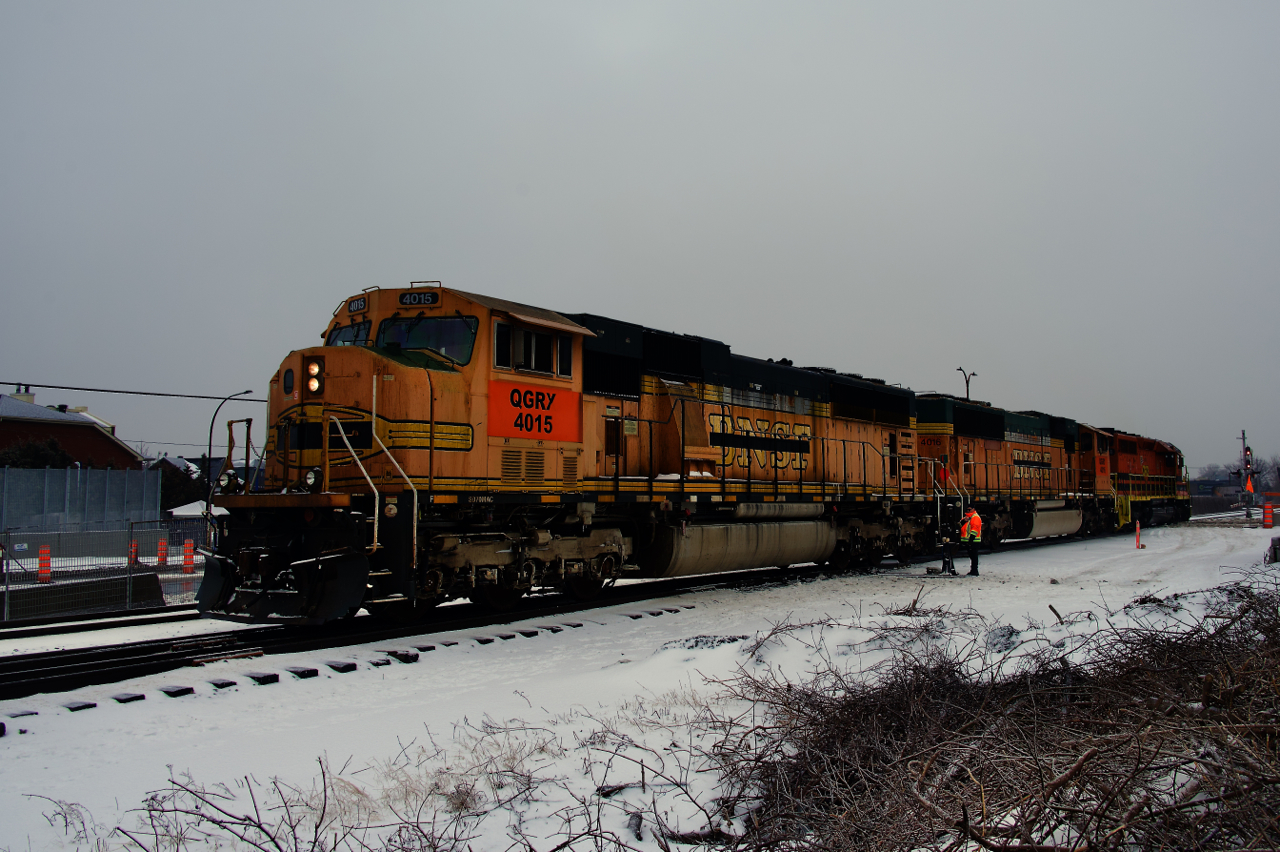 Quebec Gatineau is supposed to receive five ex-BNSF SD70MACs and they took delivery of the first three last December. Here two of them and an SD40-2 (QGRY 4015, QGRY 4016 & QGRY 3334) back into a siding off CP's Adriondack Sub to pick up the first grain train of the season for Quebec City. The conductor has just thrown the switch.