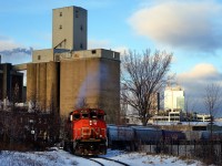 The Pointe St-Charles Switcher is shoving grain loads into Ardent Mills.