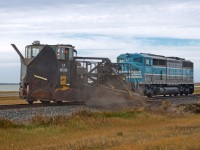 SD40-2F CMQ 9010 and Jordan Spreader CP 402998 are in the process of cutting away some soil and ballast on the north side of the main between Morse and Herbert SK on the Swift Current Sub. Perhaps prepping for winter and the subsequent spring runoff? I wont pretend to know.