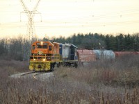 QGRY 2301 and RLK 4001 heading north on the Stelco Spur with eight coil cars trailing.