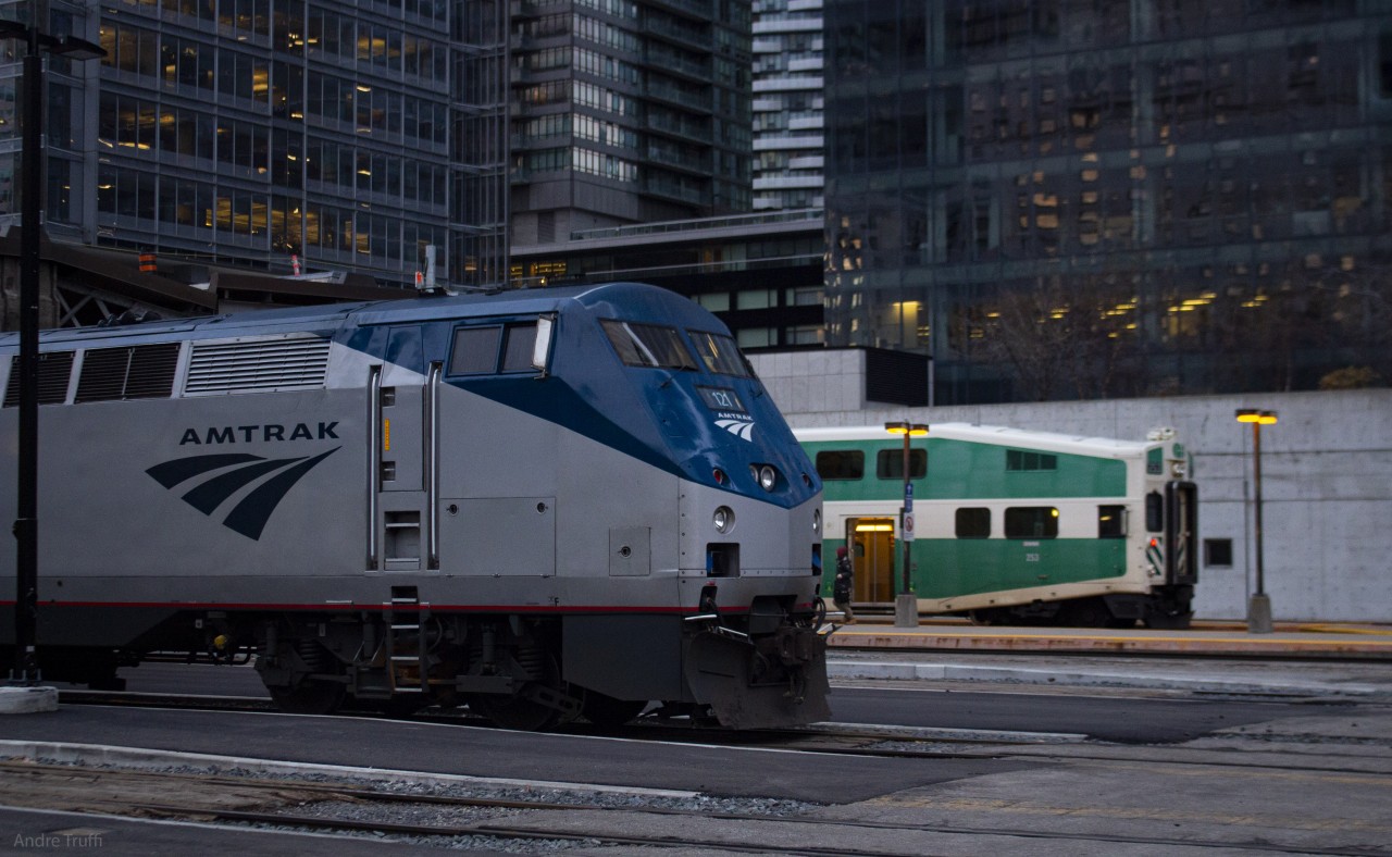 A Amtrak Maple Leaf at Union station preparing to depart as GO 253 is boarding