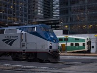 A Amtrak Maple Leaf at Union station preparing to depart as GO 253 is boarding