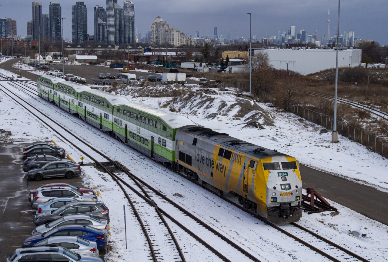 VIA rail locomotive 904 pushing 4 newly rebuilt and repainted GO coaches from VIA Rail's Toronto Maintenance Center, into GO Transit's Willowbrook Yard.