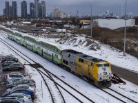 VIA rail locomotive 904 pushing 4 newly rebuilt and repainted GO coaches from VIA Rail's Toronto Maintenance Center, into GO Transit's Willowbrook Yard. 