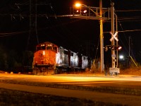 The clock strikes 1am in Scarborough so of course it's only natural that I am out railfanning. CN L546 is reversing past Birchmount Avenue into Home Lumber to lift around a dozen cars before spotting another dozen later in the light. CN 546 this night is made up of CN 9639, CN 4798, CN 4709, and ONT 1603. 1603 is en route to the York-Durham Heritage Railway, nearly 2 weeks after the original planned delivery date. It would take another 2 weeks for 1603 to get to the YDHR and by then, "mechanical issues" had sidelined the tourist train for the season. The crew was mostly cheerful throughout the night (they might have been tipped off that railfans were going to be around) and the 4 of us shooting it enjoyed a relatively calm night of chasing.