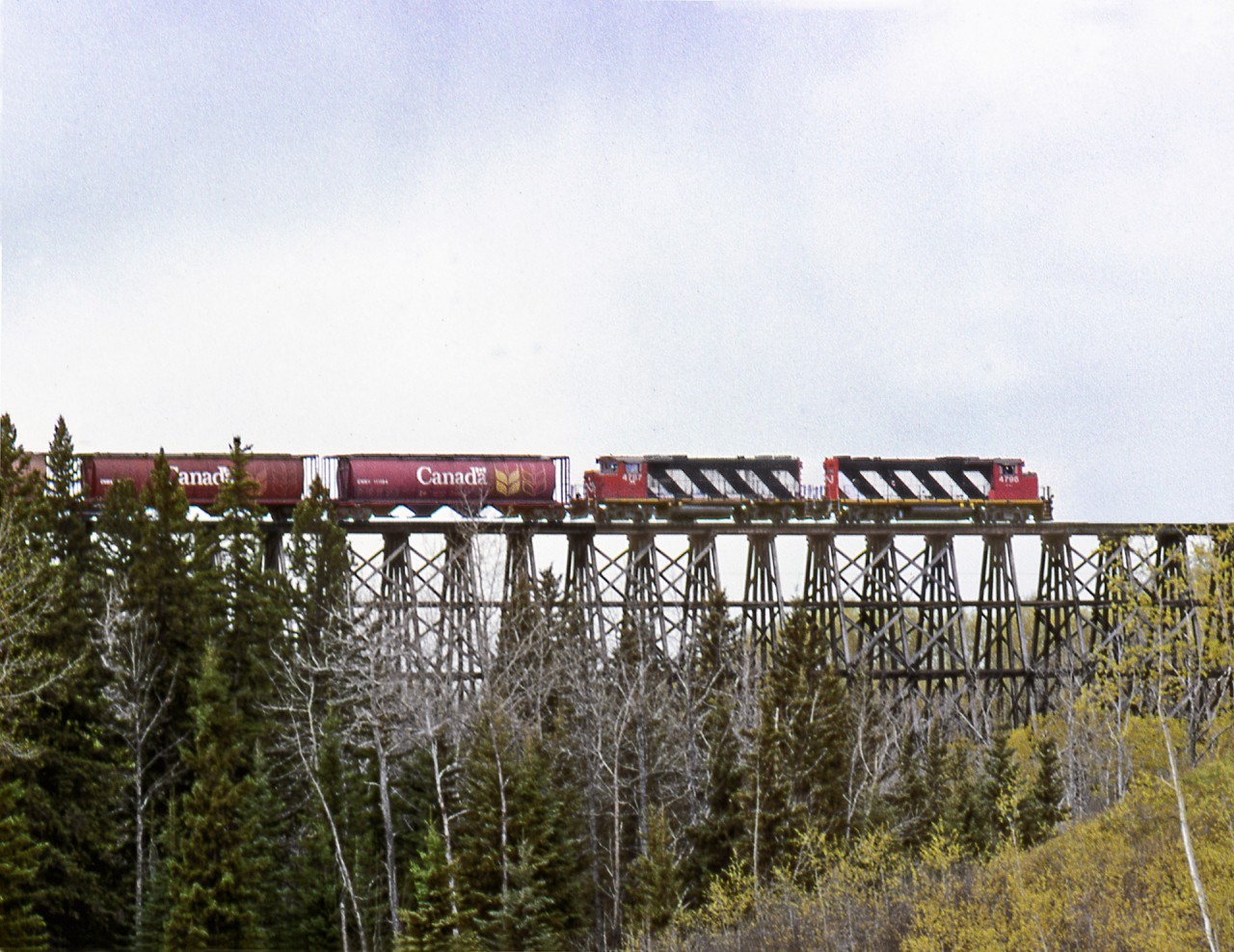CN's Grande Prairie to Dawson Creek wayfreight crosses the Dawson Creek just a few miles east of Dawson Creek. Since CN takeover of BCOL this former NAR line is out of service west of Hythe Alberta. The industries in Dawson creek are now all served from Prince George and Chetwynd
