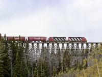 CN's Grande Prairie to Dawson Creek wayfreight crosses the Dawson Creek just a few miles east of Dawson Creek. Since CN takeover of BCOL this former NAR line is out of service west of Hythe Alberta. The industries in Dawson creek are now all served from Prince George and Chetwynd 